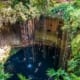 Swim in the stunning Ik Kil Cenote - a day trip from Tulum