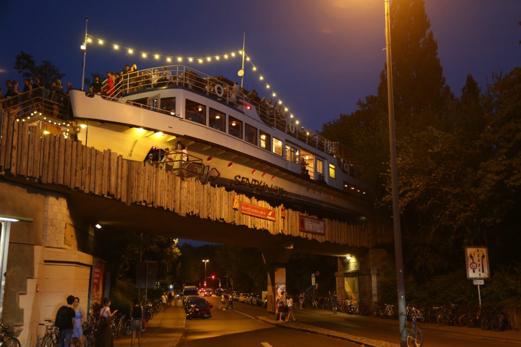 The Alte Utting boat sits atop a bridge and functions as a restaurant and bar