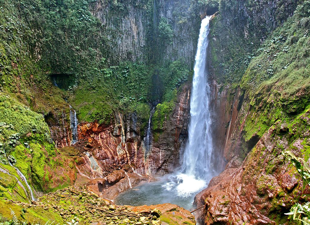 Catarata del Toro Waterfall cascading into a volcanic crater - hiking in costa rica