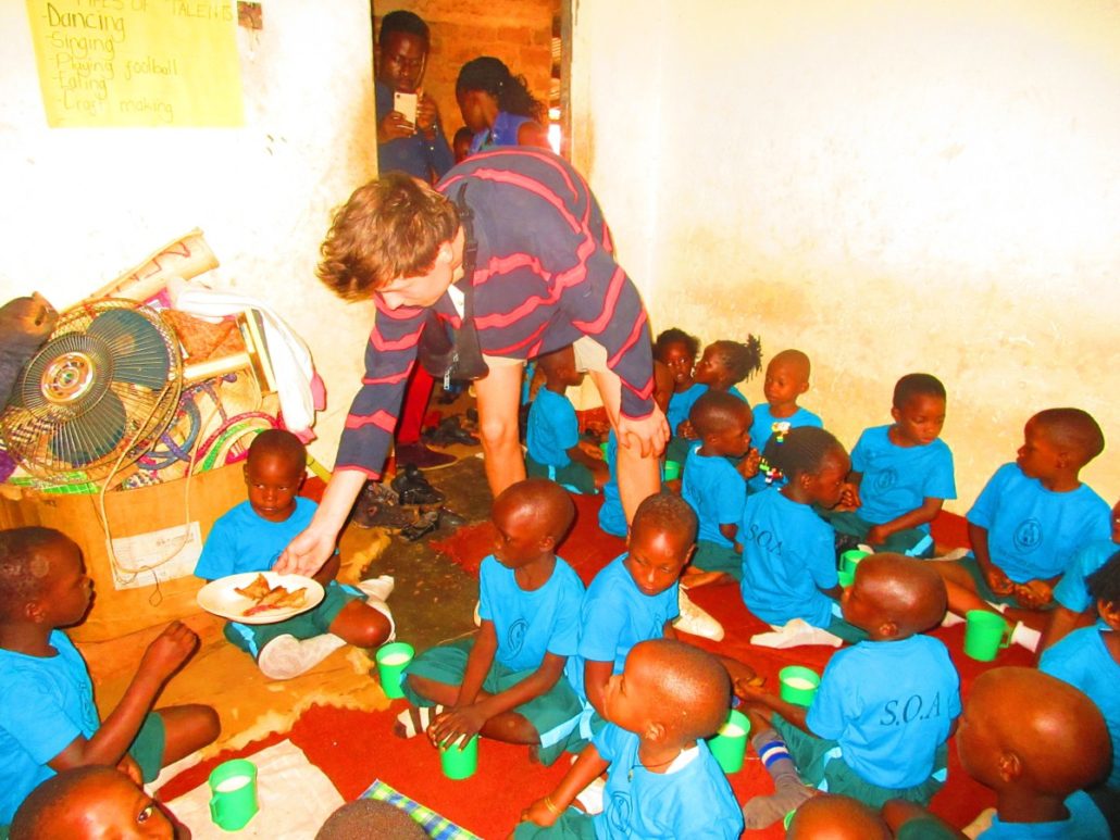 Volunteering is a great way to travel Uganda on a budget