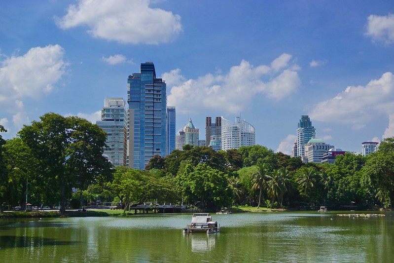 Lumphini Park with the Bangkok skyline in the background